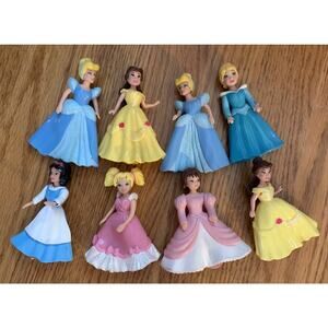 Lot of 8 Polly Pocket Dolls with Dresses plus an  Additional 21 Dresses